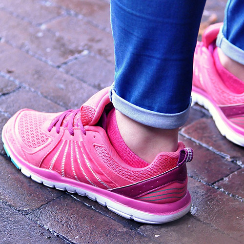 pink sneakers with blue tights